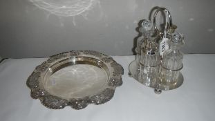 A silver plated tray and a 4 bottle cruet