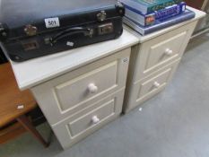 A pair of 2 drawer bedside chests