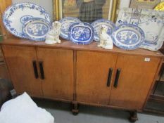 A 4 door oak sideboard