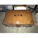 An old Victorian leather suitcase with fitted interior