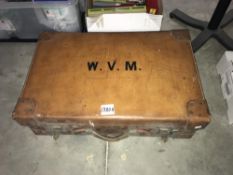 An old Victorian leather suitcase with fitted interior