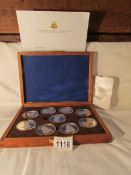 A Birmingham mint 'Queen's of the British Isles' collection of 9 silver medals in presentation case