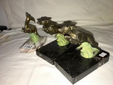 A pair of spelter greyhounds on marble bases (one a/f) and a spelter deer on marble base