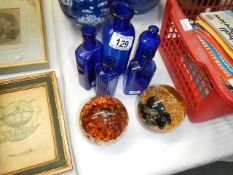 2 Langham paperweights and 5 glass medicine bottles