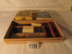 A set of coloured lantern slides 'Willie's Revenge' in original box ,