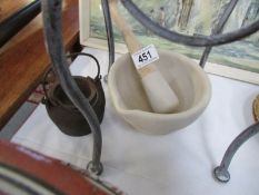 A pestle and mortar and an old glue pot