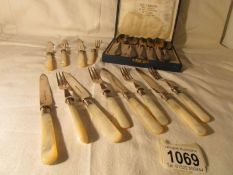 A cased set of 6 Carl Weishaum art nouveau spoons and a set of 6 mother of pearl handled knives