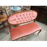 A late 20th century Queen Anne style 2 seat bedroom couch