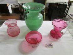 An old green glass vase and 3 cranberry glass items