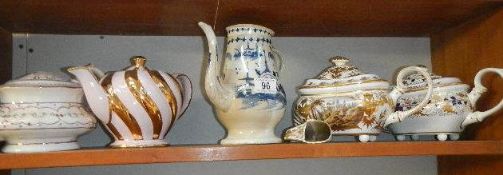 5 old teapots,