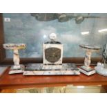 An Art Deco French marble clock garniture