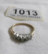 An 18ct gold 5 stone diamond ring,