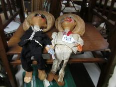 A pair of Mexican figure puppets