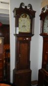 An oak 8 day painted dial Grandfather clock with weights and pendulum,