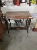 A mahogany inlaid side table with under gallery