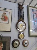 A banjo style barometer and 2 others