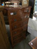 A good 20th century serpentine fronted 6 drawer chest on carved bracket feet, in good condition,