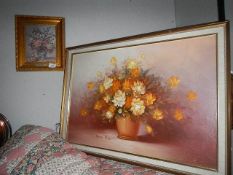 An oil painting of floral arrangement signed Susan Page and another signed A Williams