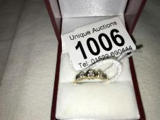 A 10k gold ring set 3 diamonds,