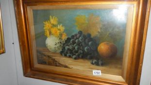 An oil on board still life study of fruit and flowers, signed G Evason 1898,