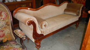 A mahogany framed double ended chaise longue