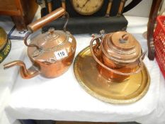 2 copper kettles and a brass tray