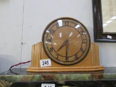 An art deco electric mantel clock