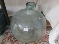 A large glass carboy