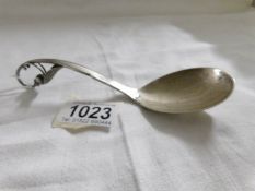 A sterling silver ornate ladle by George Jensen