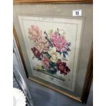 A framed and glazed floral print