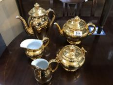 A Royal Worcester tea pot, coffee pot,