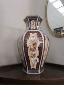 A Chinese vase decorated with exotic birds and flowers