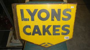 A double sided Lyons cake enamel sign