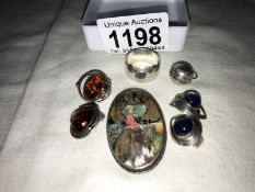 2 pairs of vintage earrings (one set amber and the other set gem stones), a silver portrait brooch,