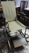 A WW1 folding wheel chair in good condition