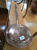 A copper warming pan