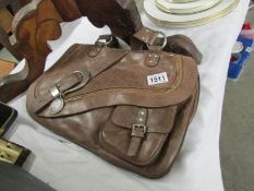 A Christian Dior saddle bag marked on tag 06-MA-0036