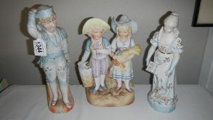 A bisque figure group and 2 others