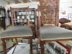 A pair of mahogany bedroom chairs