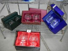 2 boxed pairs of cut glass whisky tumblers and 2 boxed pairs of cut glass brandy goblets