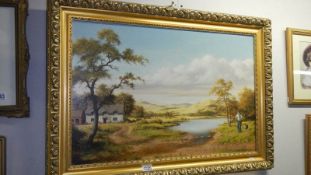 A gilt framed oil on canvas rural scene signed Colin Webster
