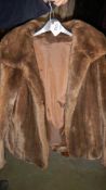 A faux fur coat,