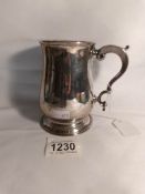 A silver tankard hall marked London 1865/66