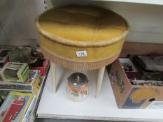 A dressing table stool