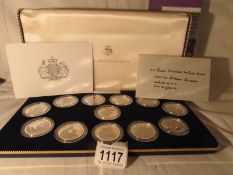 A Birmingham mint set of 12 silver medals to commemorate the 80th birthday of Queen Elizabeth the