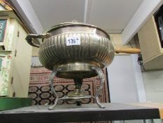 A silver plated tureen on stand complete with burner