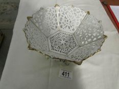 A porcelain fretwork fruit bowl