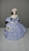 A Royal Doulton figurine,