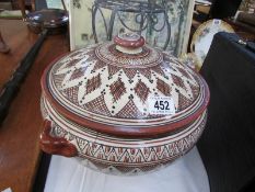 A large earthenware tureen,