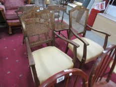 A pair of cane back chairs